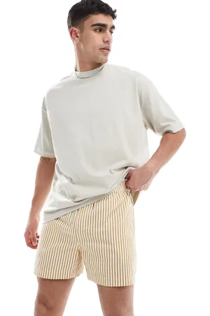 ASOS Wide shorter length short in yellow and white stripe