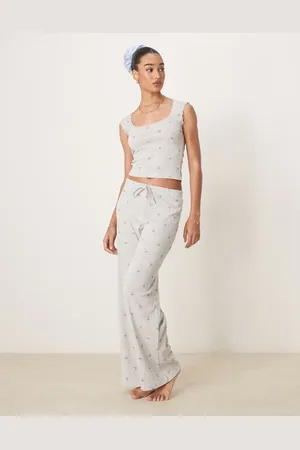 Gina Tricot Mix and match pointelle embroidered edge cotton pyjama bottoms with blue bows in melange