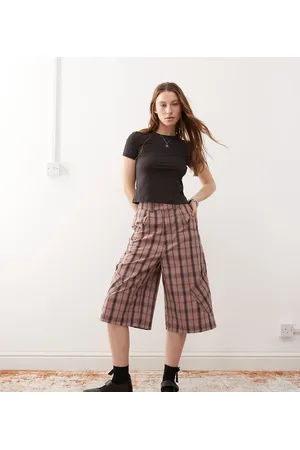 COLLUSION Baggy longline jorts in check