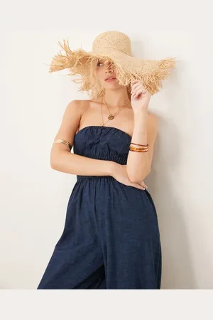 ASOS Soft denim strapless wide leg jumpsuit with shirring waist in rinse wash
