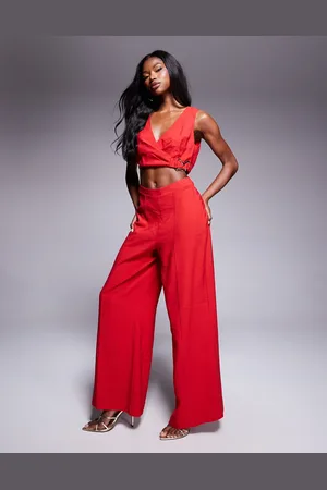 ASOS Wrap front cut out jumpsuit with buckle detail in