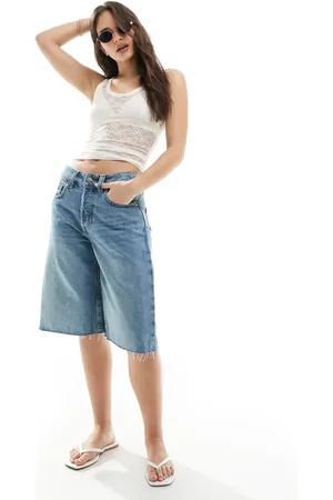 Monki Peggy low waist baggy denim shorts in mid wash
