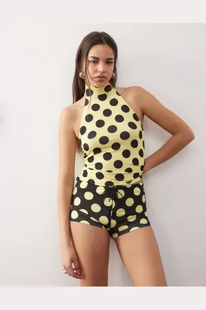 COLLUSION Micro mini shorts in yellow giant spot with lace up co-ord