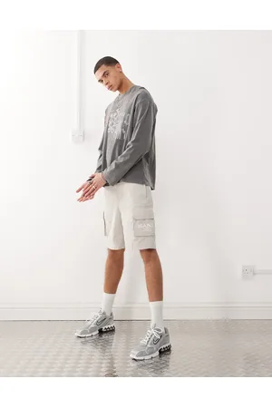 Karl Kani Retro washed cargo shorts in off