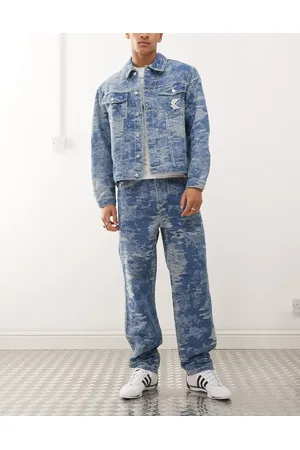 Karl Kani OG distressed camo five pocket denim jean in mid wash