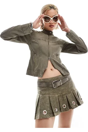 COLLUSION Festival pleated mini skirt with eyelets in oil wash co-ord