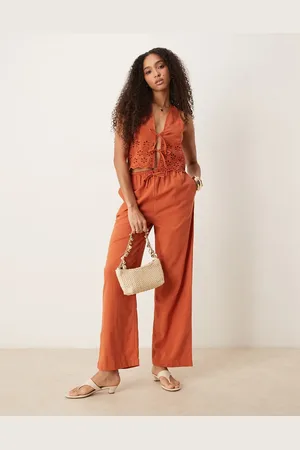 Iisla & Bird Ruffle front beach trouser co-ord in rust
