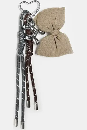 Sui Ava Bag charm with bow and rope details in