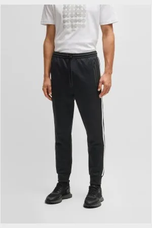 HUGO BOSS Para homem. 50537373 Calças de fato de treino de ajuste descontraído com círculos de tecido jacquard (S), Casual, Poliéster