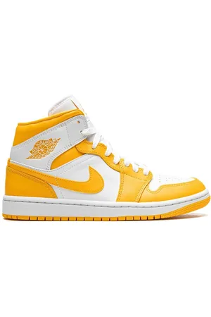 Jordan 1 Mid "White/University Gold" sneakers