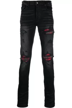 AMIRI Distressed slim-cut jeans