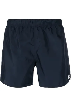 Courrèges Logo-patch plain swim shorts