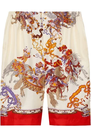 Gucci All-over graphic-print shorts