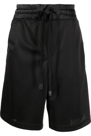 VERSACE Debossed-logo shorts