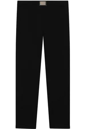 Dolce & Gabbana Logo-plaque stretch-wool leggings