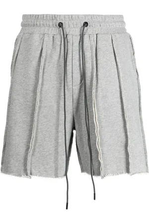 MOSTLY HEARD RARELY SEEN Exposed-seam cotton track shorts