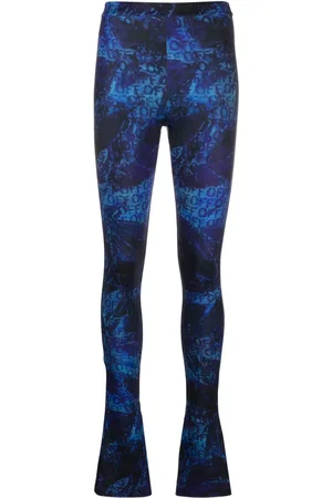 OFF-WHITE All-over logo-print flared trousers