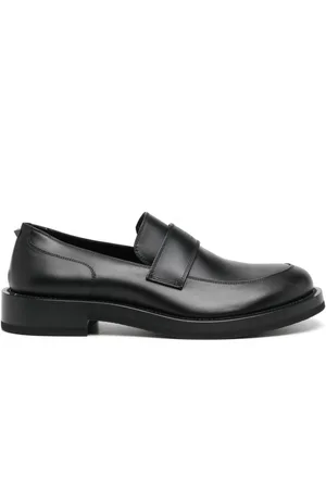 VALENTINO GARAVANI Logo-debossed leather loafers