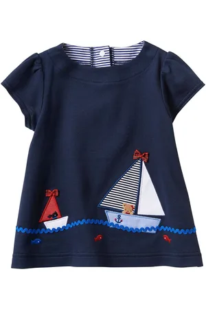 Familiar Motif-embroidered cotton blouse