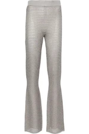 REMAIN Metallic striped flared trousers