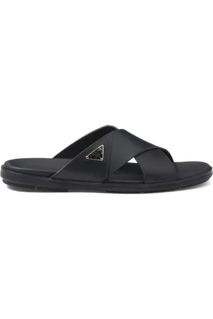 Prada Leather crisscross slides