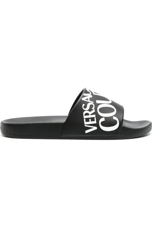 VERSACE Logo-embossed moulded-footbed slides