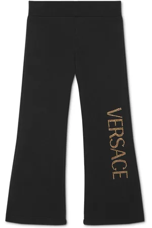 VERSACE Logo-studded flared trousers
