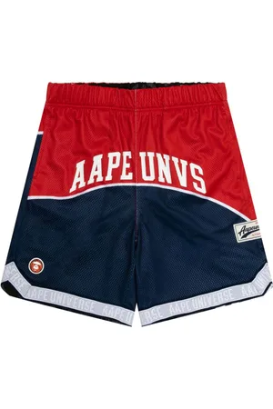 A Bathing Ape Mix-print reversible track shorts