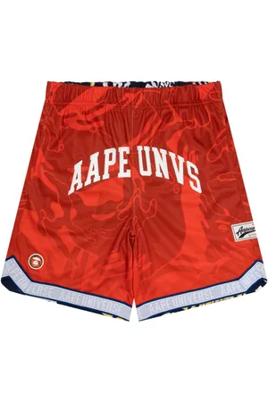 A Bathing Ape Mix-print reversible track shorts