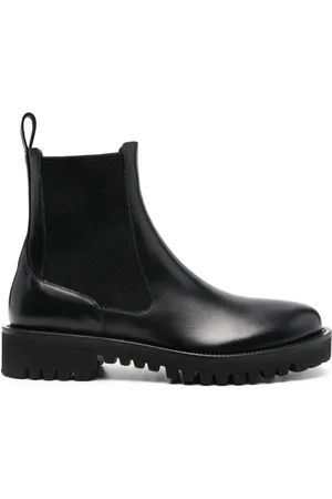 VALENTINO GARAVANI Toile Iconographe leather boots