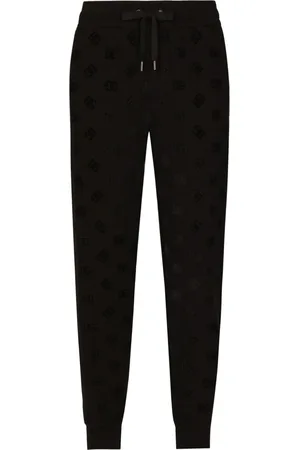 Dolce & Gabbana Monogram-embossed cotton track pants