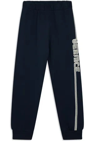 VERSACE Logo-print trousers