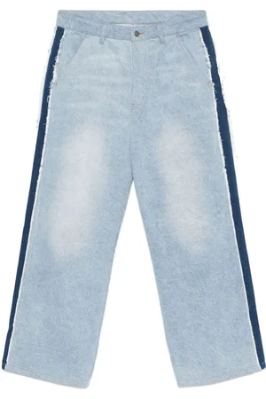 KIDSUPER STUDIOS X Ronaldinho stripe-detail jeans