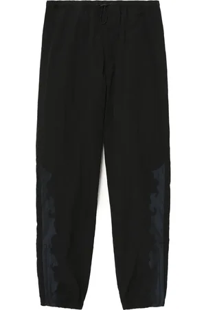 TOGA PULLA Tapered-leg trousers