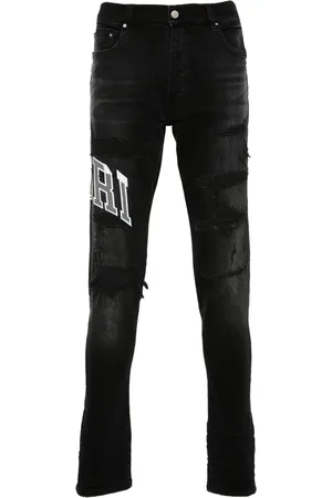 AMIRI Varsity Logo Repair jeans