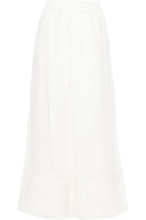 ALÉMAIS Pegasus-embroidered linen trousers