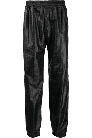 Givenchy Embossed-4G pattern leather trousers