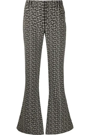 Balmain Low-rise monogram bootcut trousers