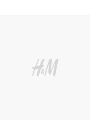 H&M Calças largas em sarja