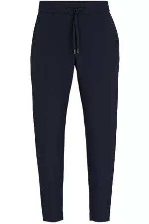 HUGO BOSS Chinos de ajuste afunilado em tecido elástico de quatro vias fácil de engomar