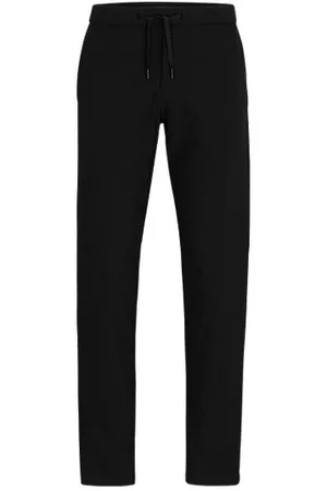 HUGO BOSS Homem Calças - Chinos de ajuste slim em tecido elástico repelente à água