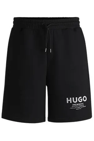 HUGO BOSS Calções de ajuste largo em algodão terry com estampado de logótipo