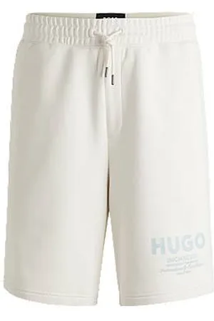 HUGO BOSS Calções de ajuste largo em algodão terry com estampado de logótipo