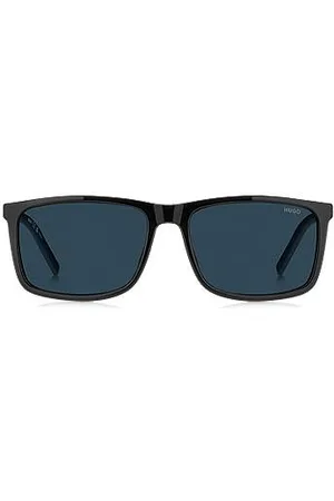 HUGO BOSS Óculos escuros em preto com lentes escurecidas em azul