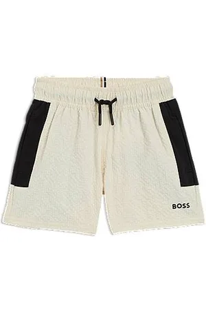 HUGO BOSS Calções de banho de criança com tecido listrado e logótipo estampado.
