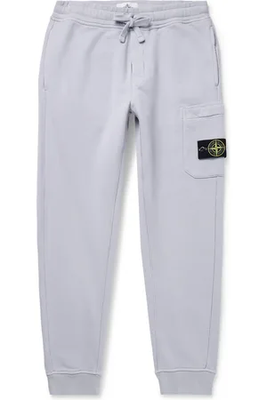 Stone Island Tapered Logo-Appliquéd Garment-Dyed Cotton-Jersey Sweatpants