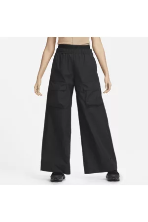 Nike Mulher Calças Cintura Subida & Alta - Calças largas de cintura subida em tecido não rasgável Sportswear Tech Pack para mulher