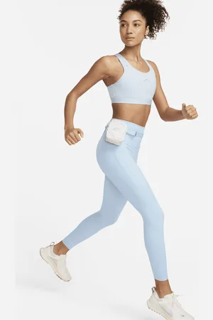Leggings a 7/8 de cintura normal com grafismo e bolsos Nike Fast para mulher