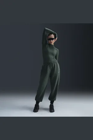 Nike Calças de fato de treino folgadas de cintura subida Sportswear Phoenix Fleece para mulher