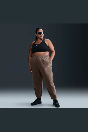 Nike Calças de fato de treino folgadas de cintura subida Sportswear Phoenix Fleece para mulher (tamanhos grandes)